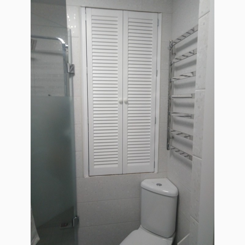 Фото 13. Дверцы для сантехнического шкафа в туалете